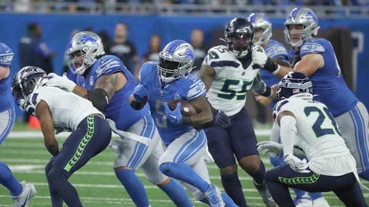 Detroit Lions running back David Montgomery (5) runs the ball against the Seattle Seahawks during first half action Sunday, Sept.17 2023. Detroit Lions running back David Montgomery (5) runs the ball against the Seattle Seahawks during first half action Sunday, Sept.17 2023.