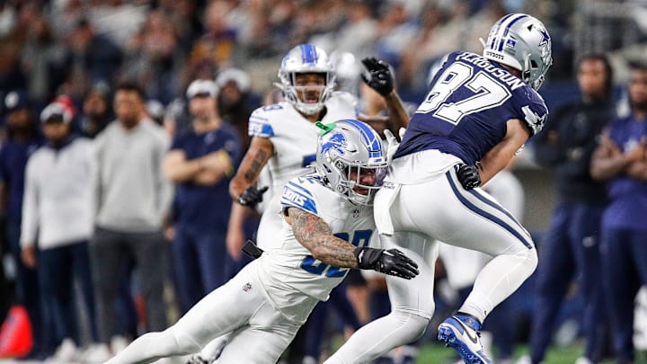 Detroit Lions safety Brian Branch (32) tackles Dallas Cowboys tight end Jake Ferguson (87).