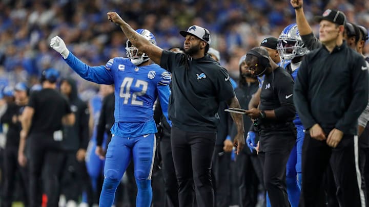 Detroit Lions linebackers coach Kelvin Sheppard reacts to a play against Tampa Bay Buccaneers during the second half of the NFC divisional round at Ford Field in Detroit on Sunday, Jan. 21, 2024.