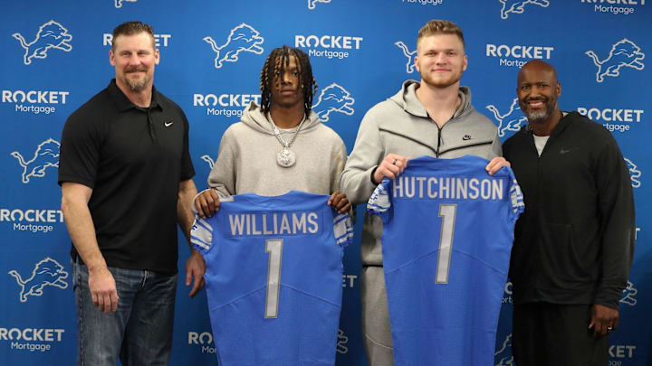 Detroit Lions head coach Dan Campbell, Jameson Williams, and Aidan Hutchinson pose for a picture with GM Brad Holmes. Detroit Lions head coach Dan Campbell, Jameson Williams, and Aidan Hutchinson pose for a picture with GM Brad Holmes.