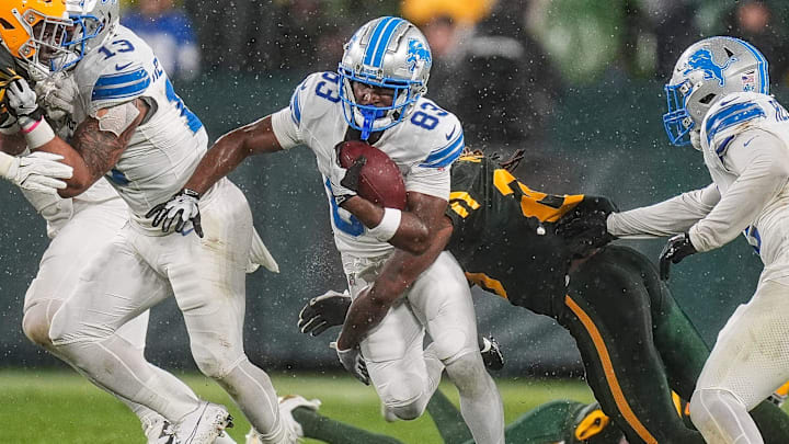 Detroit Lions punt return Isaiah Williams (83) runs against Green Bay Packers during the second half at Lambeau Field in Green Bay, Wis. on Sunday, Nov. 3, 2024.