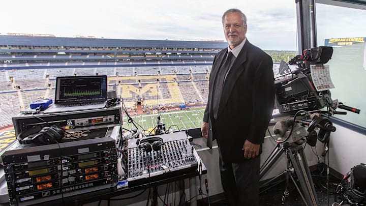 Big Ten Network's Matt Millen is pictured in the broadcast booth at Michigan Stadium in Ann Arbor before calling a Wolverines game.