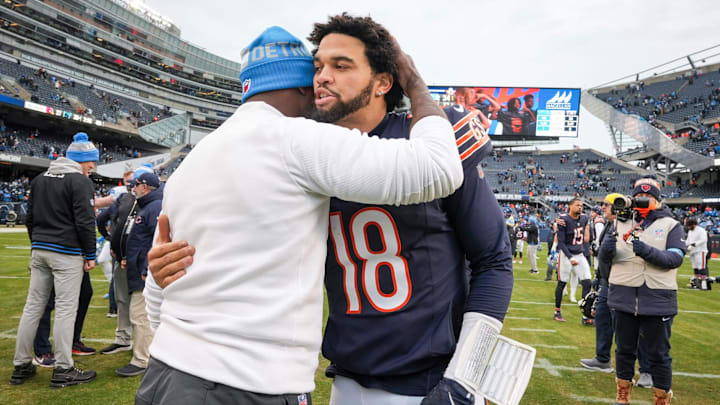 Detroit Lions defensive coordinator Aaron Glenn embraces Chicago Bears quarterback Caleb Williams (18) after a game at Soldier Field in Chicago, Ill., on Sunday, Dec. 22, 2024. The Lions defeated the Bears with a score of 34-17.