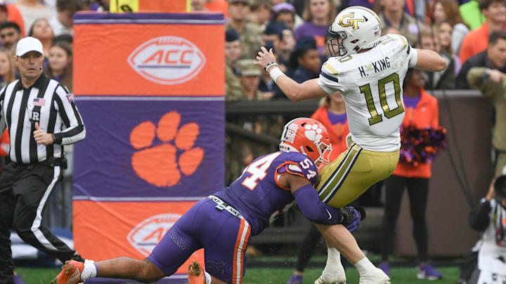 Nov 11, 2023; Clemson, South Carolina, USA; Clemson Tigers linebacker Jeremiah Trotter Jr. (54) sacks Georgia Tech Yellow Jackets quarterback Haynes King (10) during the second quarter at Memorial Stadium. Mandatory Credit: Ken Ruinard-Imagn Images
