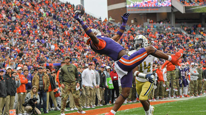 Clemson receiver Tyler Brown (6) catches a pass for a touchdown near Georgia Tech defensive back Jayloh King (14) during the second quarter in Clemson, S.C. Saturday, Nov 11, 2023; Clemson, South Carolina, USA; at Memorial Stadium.
