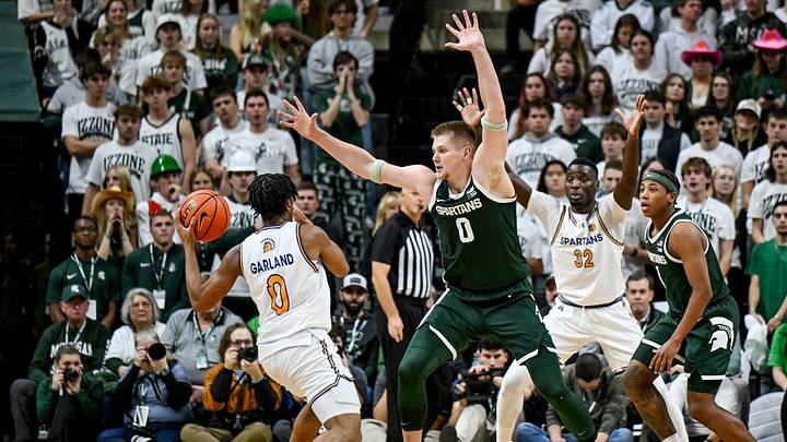 Michigan State's Jaxon Kohler, center, defends against San Jose State's Colby Garland during the second half on Thursday, Nov. 13, 2025, at the Breslin Center in East Lansing. Michigan State's Jaxon Kohler, center, defends against San Jose State's Colby Garland during the second half on Thursday, Nov. 13, 2025, at the Breslin Center in East Lansing.