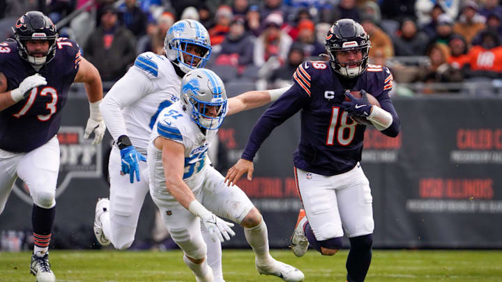 Chicago Bears quarterback Caleb Williams (18) makes a run at Soldier Field during a game against the Detroit Lions Chicago Bears quarterback Caleb Williams (18) makes a run at Soldier Field during a game against the Detroit Lions