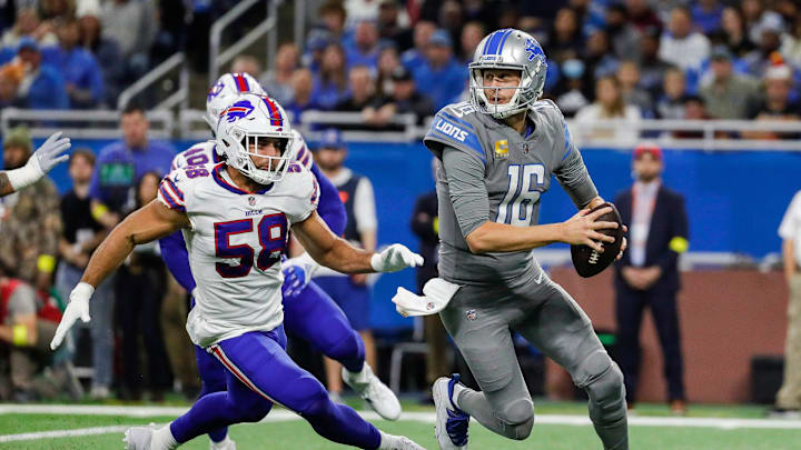 Detroit Lions quarterback Jared Goff (16) is chased by Buffalo Bills linebacker Matt Milano (58)