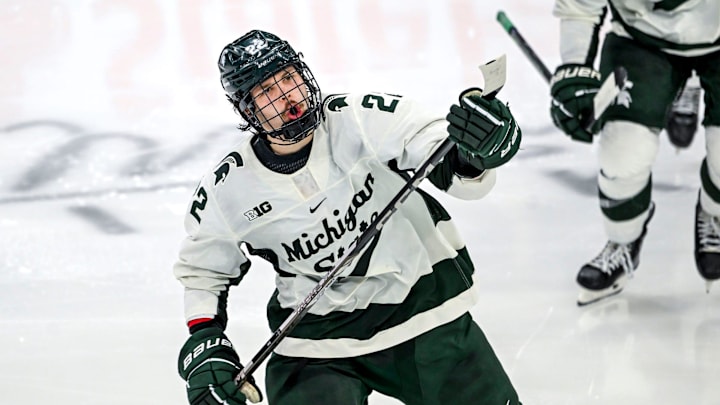 Michigan State's Isaac Howard celebrates his goal against Notre Dame during the third period in the Big Ten tournament on Saturday, March 15, 2025, at Muni Arena in East Lansing. Michigan State's Isaac Howard celebrates his goal against Notre Dame during the third period in the Big Ten tournament on Saturday, March 15, 2025, at Muni Arena in East Lansing.