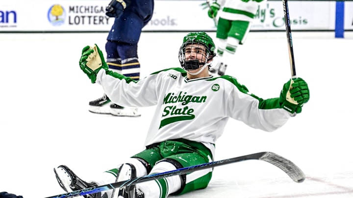 Michigan State's Porter Martone celebrates his empty net goal against Notre Dame during the third period on Thursday, Feb. 19, 2026, at the Munn Ice Arena in East Lansing.