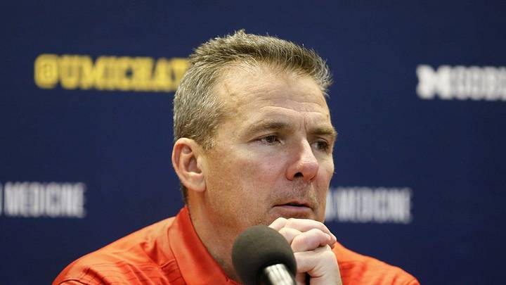 Ohio State Buckeyes head coach Urban Meyer answers questions during the post-game press conference following a 31-20 win over the Michigan Wolverines in Saturday's NCAA Division I football game at Michigan Stadium in Ann Arbor on November 25, 2017. Ohio State Buckeyes head coach Urban Meyer answers questions during the post-game press conference following a 31-20 win over the Michigan Wolverines in Saturday's NCAA Division I football game at Michigan Stadium in Ann Arbor on November 25, 2017.