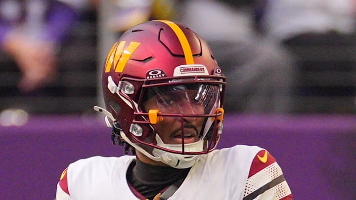 Washington Commanders quarterback Jayden Daniels drops back to pass against the Minnesota Vikings. Washington Commanders quarterback Jayden Daniels drops back to pass against the Minnesota Vikings.