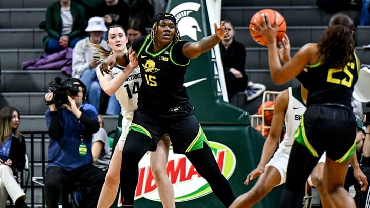 Michigan State's Grace VanSlooten, left, guards Oregon's Phillipina Kyei, center, during the first quarter on Thursday, Jan. 30, 2025, at the Breslin Center in East Lansing. Michigan State's Grace VanSlooten, left, guards Oregon's Phillipina Kyei, center, during the first quarter on Thursday, Jan. 30, 2025, at the Breslin Center in East Lansing.