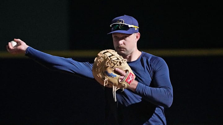 Milwaukee Brewers Rhys Hoskins warms up during a workout ahead of the Tuesday Milwaukee Brewers National League Wild Card playoff series at American Family Field in Milwaukee on Monday, Sept. 30, 2024.