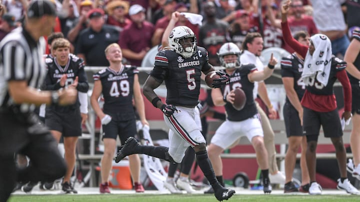 South Carolina running back Raheim Sanders (5) runs by Louisiana State University cornerback Ashton Stamps (1) for a touchdown during the fourth quarter at Williams-Brice Stadium in Columbia, S.C. Saturday, September 14, 2024.