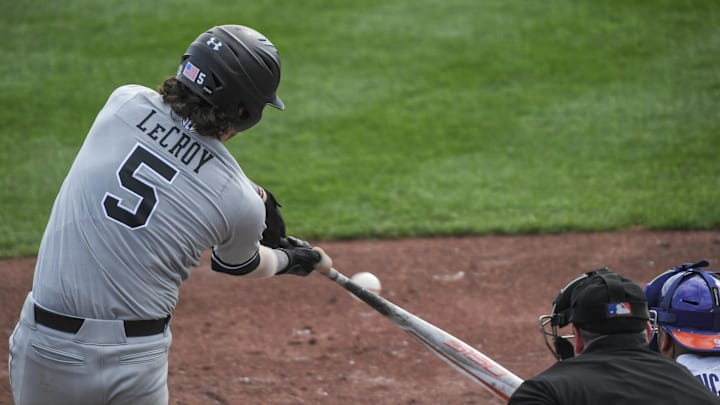 South Carolina freshman Talmadge LeCroy (5) hits a ball during the top of the third inning at Doug Kingsmore Stadium in Clemson Sunday, March 6,2022.
Ncaa Baseball South Carolina At Clemson South Carolina freshman Talmadge LeCroy (5) hits a ball during the top of the third inning at Doug Kingsmore Stadium in Clemson Sunday, March 6,2022.
Ncaa Baseball South Carolina At Clemson