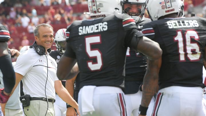 South Carolina Head Coach Shane Beamer communicates in the game playing Louisiana State University during the first quarter at Williams-Brice Stadium in Columbia, S.C. Saturday, September 14, 2024.