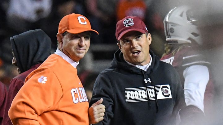 Clemson head coach Dabo Swinney and South Carolina Head Coach Shane Beamer talk before the game at Williams Brice Stadium in Columbia, South Carolina Saturday, November 27, 2021.