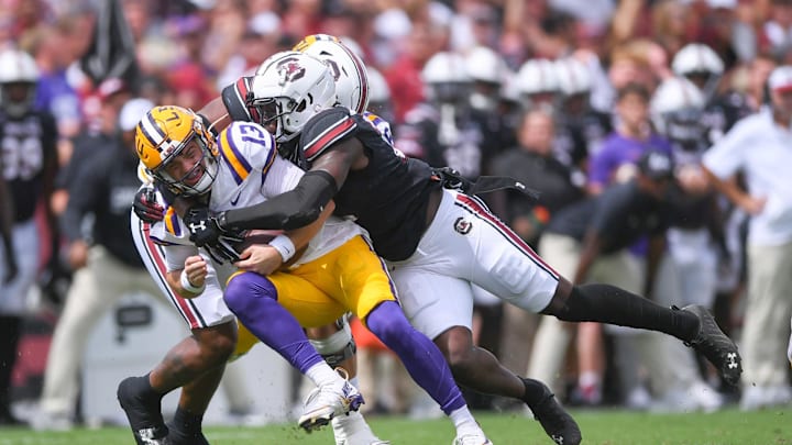 South Carolina linebacker Bam Martin-Scott (22) sacks Louisiana State University quarterback Garrett Nussmeier (13) during the first quarter at Williams-Brice Stadium in Columbia, S.C. Saturday, September 14, 2024.