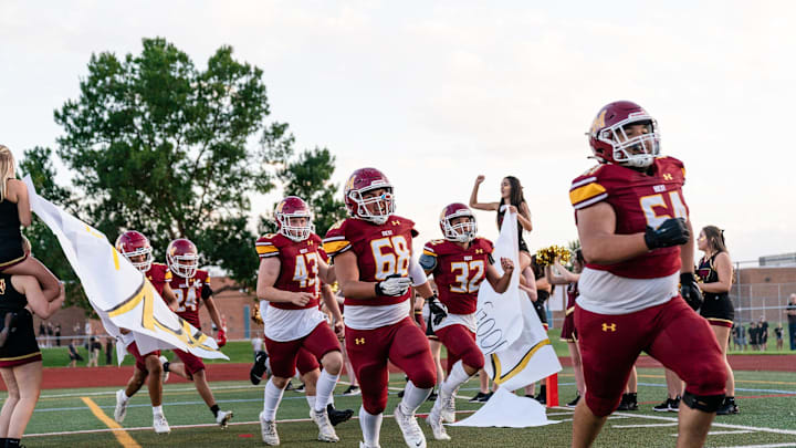 Rocky Mountain takes the field before a high school football game against Broomfield on Thursday, Sept. 12, 2024 at French Field in Fort Collins, Colo.