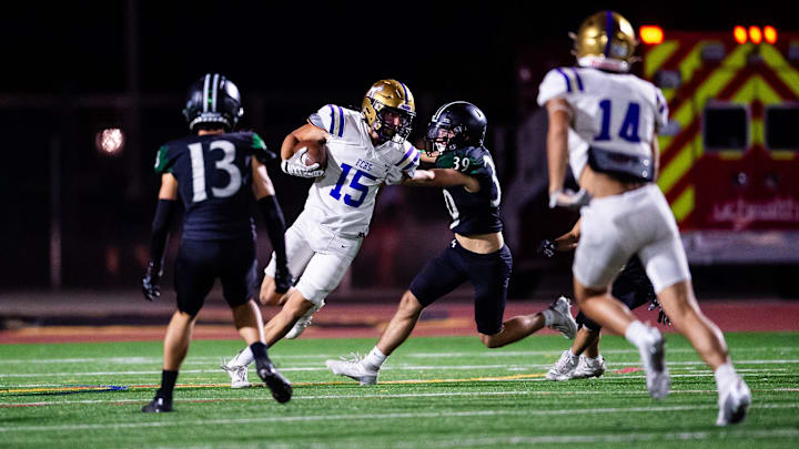 Fort Collins' Evan Kadrich tries to get around a defender during a city rivalry game against Fossil Ridge on Thursday, Sept. 26, 2024, at PSD Stadium in Timnath, Colo.