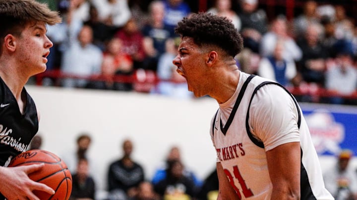Orchard Lake St. Mary's forward Jayden Savoury celebrates a play against Birmingham Brother Rice during the second half of MHSAA Division 1 quarterfinal at Calihan Hall in Detroit on Tuesday, March 12, 2024.