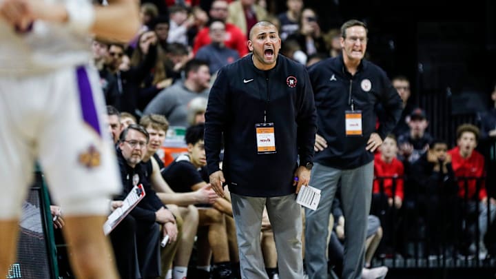 Grand Rapids Northview head coach David Chana reacts to a play against Warren De La Salle during the second half of an MHSAA Division 1 boys basketball state semifinal at Breslin Center in East Lansing on Friday, March 25, 2022