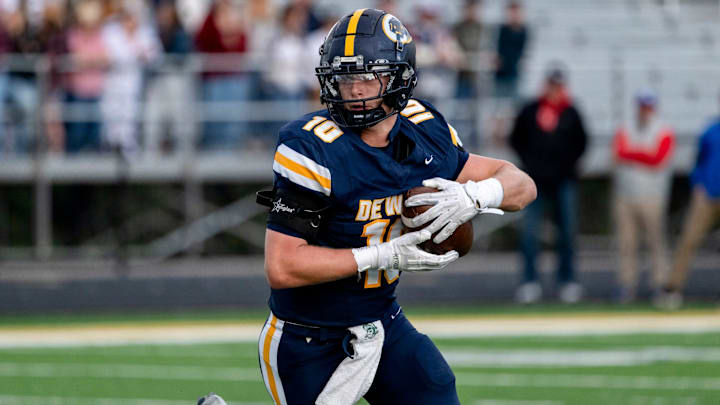 DeWitt's Jacob Schorfhaar runs after a catch against Mason during the first quarter on Friday, Sept. 5, 2025, at DeWitt High School.