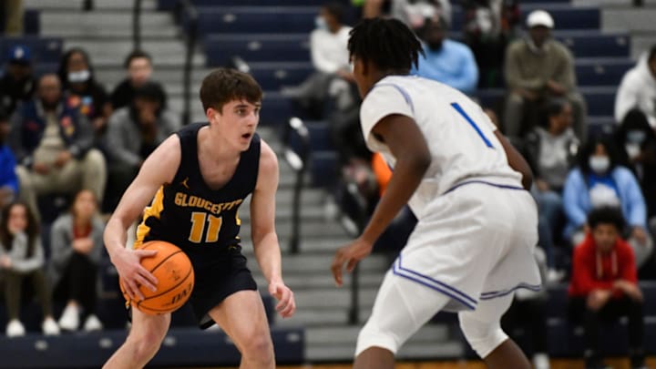 Liam Gorman (11) of Gloucester looks for a way around Burlington City's Aaron Young during their Group 1 state semifinal in Toms River on Thursday, Mar. 10, 2022.

Basketball Burlington City Vs Gloucester 3