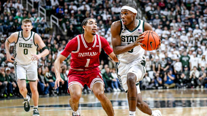 Michigan State's Tre Holloman, right, moves the ball as Indiana's Myles Rice defends during the first half on Tuesday, Feb. 11, 2025, at the Breslin Center in East Lansing. Michigan State's Tre Holloman, right, moves the ball as Indiana's Myles Rice defends during the first half on Tuesday, Feb. 11, 2025, at the Breslin Center in East Lansing.