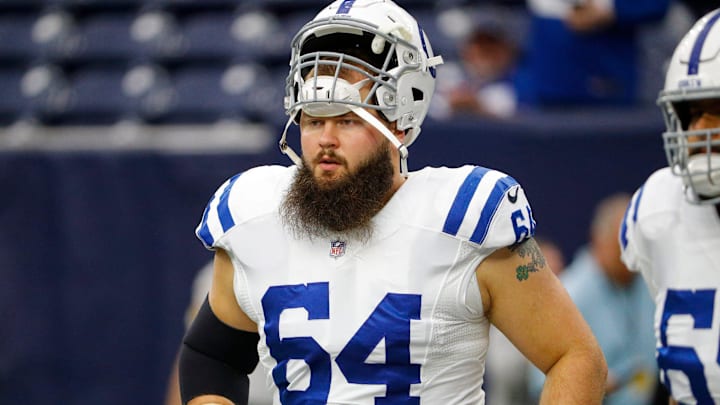 Indianapolis Colts guard Mark Glowinski (64) warms up before facing the Texans on Sunday, Dec. 5, 2021, at NRG Stadium in Houston.