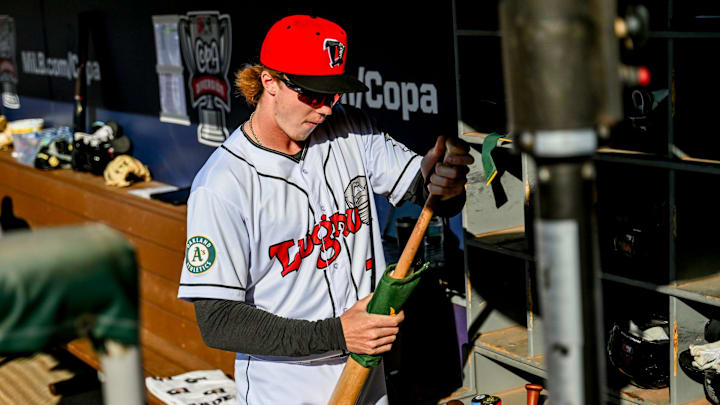 Lugnuts' Henry Bolte prepares hid bat before the home opener against the Great Lakes Loons on Tuesday, April 9, 2024, at Jackson Field in Lansing. Lugnuts' Henry Bolte prepares hid bat before the home opener against the Great Lakes Loons on Tuesday, April 9, 2024, at Jackson Field in Lansing.