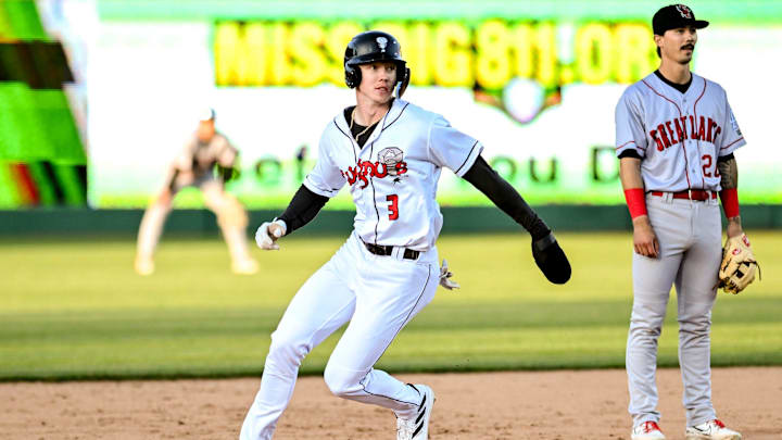 Lugnuts' Henry Bolte advances to second base against the Loons during the fifth inning on Tuesday, April 9, 2024, at Jackson Field in Lansing.