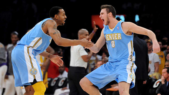 January 6, 2013;  Los Angeles, CA, USA;   Denver Nuggets small forward Danilo Gallinari (8) reacts with shooting guard Andre Iguodala (9) after he hit a 3-point shot with 13 seconds left on the clock in the game against the Los Angeles Lakers at the Staples Center. Nuggets won 112-105. Mandatory Credit: Jayne Kamin-Oncea-Imagn Images
