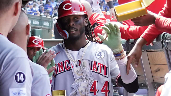 Jun 1, 2025; Chicago, Illinois, USA; Cincinnati Reds shortstop Elly De La Cruz (44) is greeted in the dugout after hitting two-run home run against the Chicago Cubs during the sixth inning at Wrigley Field. Mandatory Credit: David Banks-Imagn Images