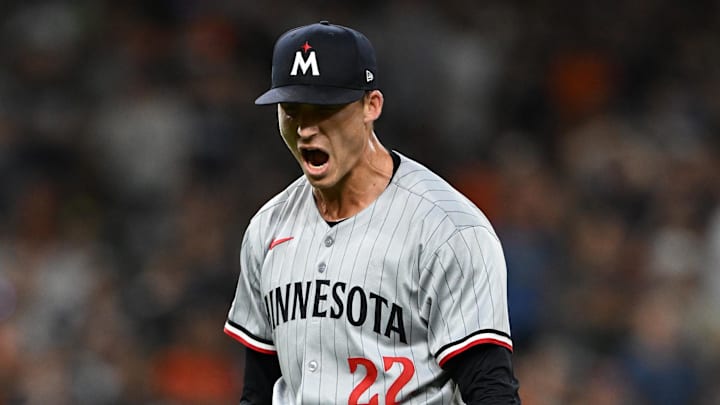 Jun 27, 2025; Detroit, Michigan, USA; Minnesota Twins relief pitcher Griffin Jax (22) reacts after striking out Detroit Tigers first baseman Spencer Torkelson (not pictured) to end the eighth inning at Comerica Park. Mandatory Credit: Lon Horwedel-Imagn Images