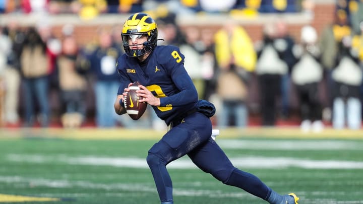 Michigan quarterback J.J. McCarthy looks to pass against Ohio State during the first half at Michigan Stadium in Ann Arbor on Saturday, Nov. 25, 2023.