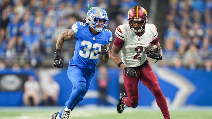 Detroit Lions safety Brian Branch (32) runs after Washington Commanders wide receiver Dyami Brown (2) in the first half of the NFC divisional round at Ford Field in Detroit on Saturday, Jan. 18, 2025.