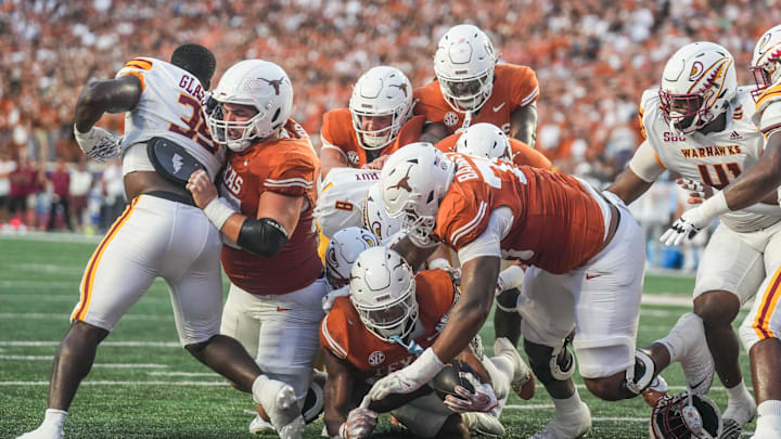 Texas Longhorns running back Jaydon Blue (23) scores a touchdown as he dives into the end zone as the Texas Longhorns take on ULM at Darrell K Royal-Texas Memorial Stadium in Austin Saturday, Sept. 21, 2024.