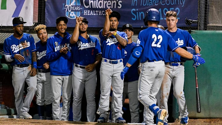 Teammates celebrate Rancho Cucamonga's Damon Keith's home run against Visalia Rawhide on Friday, April 8 on Opening Night at Valley Strong Stadium.
