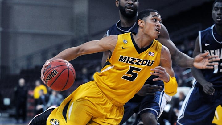 Nov 29, 2013; Las Vegas, NV, USA; Missouri Tigers guard Jordan Clarkson (5) dribbles the ball against Nevada on the second day of the Las Vegas Invitational at Orleans Arena. Missouri won the game 70-83. Mandatory Credit: Stephen R. Sylvanie-Imagn Images
