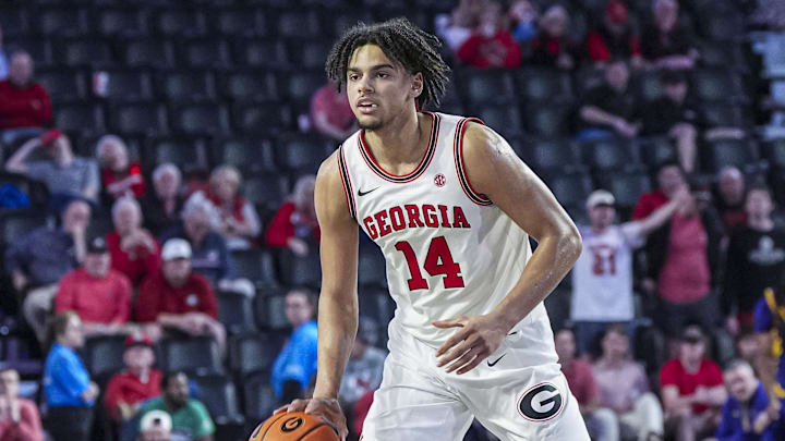 Feb 5, 2025; Athens, Georgia, USA; Georgia Bulldogs forward Asa Newell (14) controls the ball against the LSU Tigers during the second half at Stegeman Coliseum. Mandatory Credit: Dale Zanine-Imagn Images