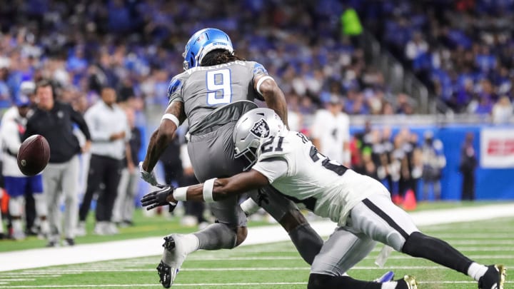 Lions wide receiver Jameson Williams misses a catch against Raiders cornerback Amik Robertson during the first half at Ford Field on Monday, Oct. 30, 2023.