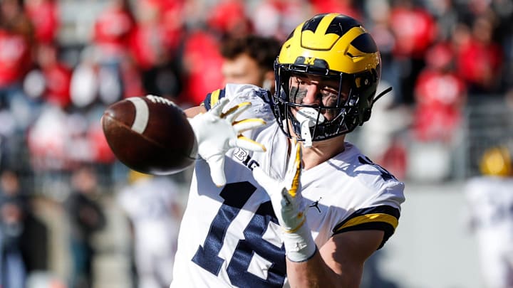 Michigan tight end Colston Loveland warms up before the game Nov. 26, 2022 against Ohio State at Ohio Stadium in Columbus. Michigan tight end Colston Loveland warms up before the game Nov. 26, 2022 against Ohio State at Ohio Stadium in Columbus.