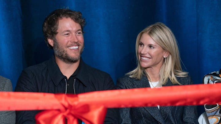 Mathew and Kelly Stafford share a laugh during speeches for the ribbon cutting of the Kelly and Matthew Stafford and Friends Education Center at the S.A.Y Detroit Play Center in Detroit on Monday, April 1, 2024.
