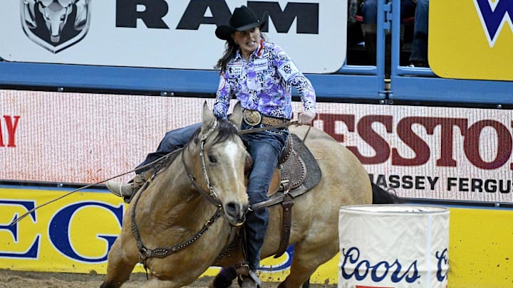 Lisa and An Oakie With Cash "Louie" in the ninth round of the 2016 NFR Lisa and An Oakie With Cash "Louie" in the ninth round of the 2016 NFR