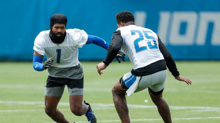 Detroit Lions cornerbacks Cam Sutton (1) and Will Harris (25) practice during minicamp in Allen Park