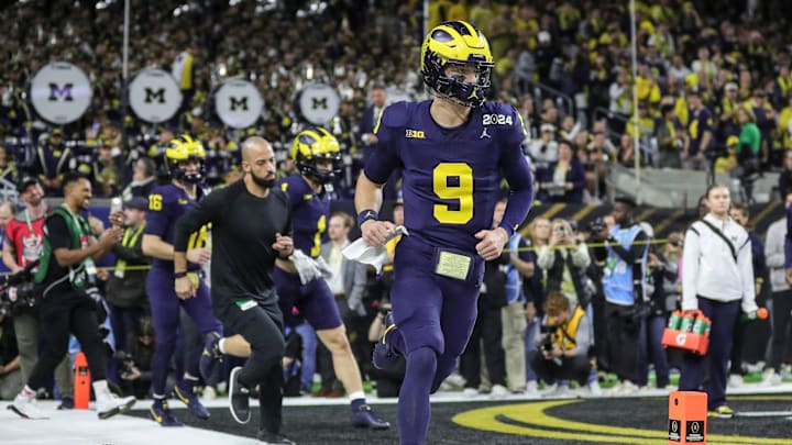 Michigan quarterback J.J. McCarthy takes the field for warmups before the national championship game