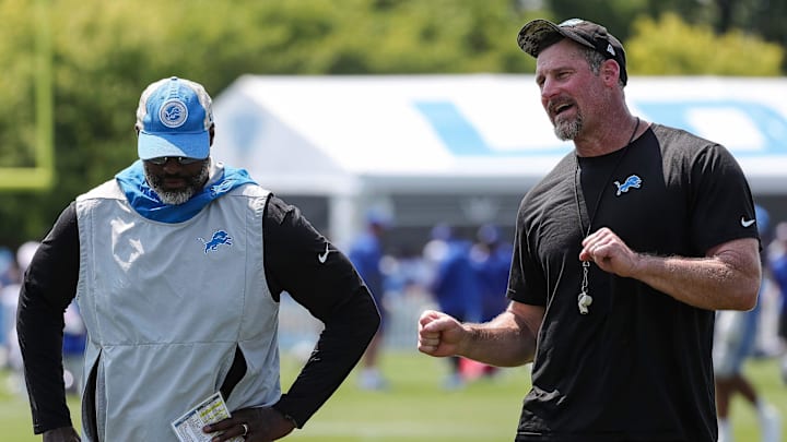 Detroit Lions head coach Dan Campbell talks to general manager Brad Holmes Detroit Lions head coach Dan Campbell talks to general manager Brad Holmes