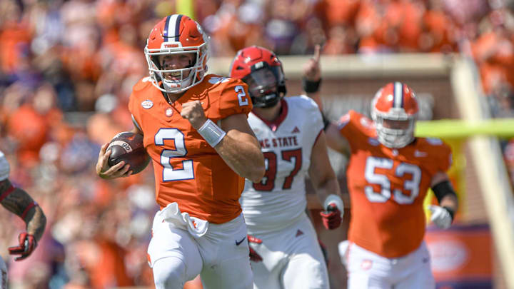 Sep 21, 2024; Clemson, South Carolina, USA; Clemson Tigers quarterback Cade Klubnik (2) runs for a touchdown against the North Carolina State Wolfpack during the first quarter at Memorial Stadium. Mandatory Credit: Ken Ruinard-Imagn Images